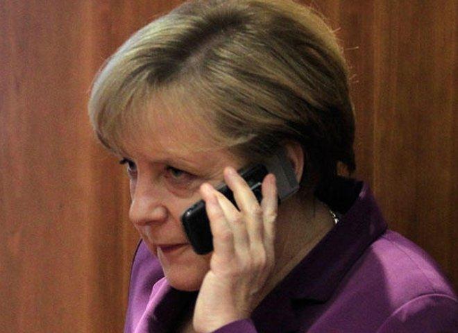 Меркель призвала Путина «отозвать собак»