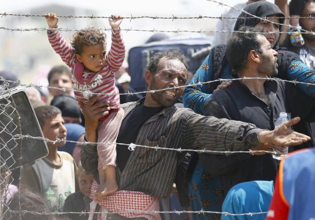 США: семь штатов отказались принимать сирийских беженцев